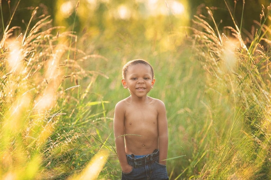 little boy, sunset, long grass, bexley, kids photographer, bromley, kent