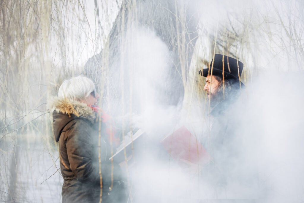 Halloween Photo, Ashleigh Shea Photography, Man and woman surrounded by white smoke holding spell books